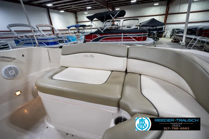 Slide: The Image of Interior of 2005 Sea Ray 200 Sundeck boat with steering wheel and seating. - 37