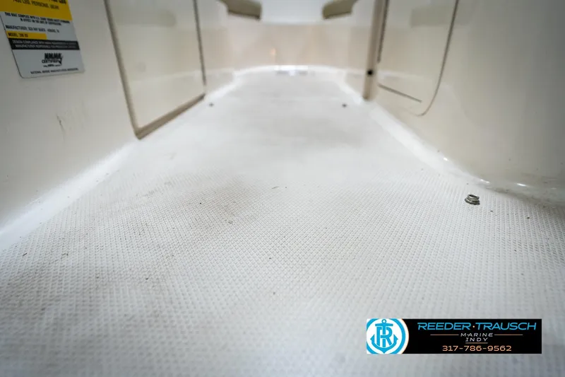 Slide: The Image of Cup holder on 2005 Sea Ray 200 Sundeck boat, featuring stainless steel finish. - 42