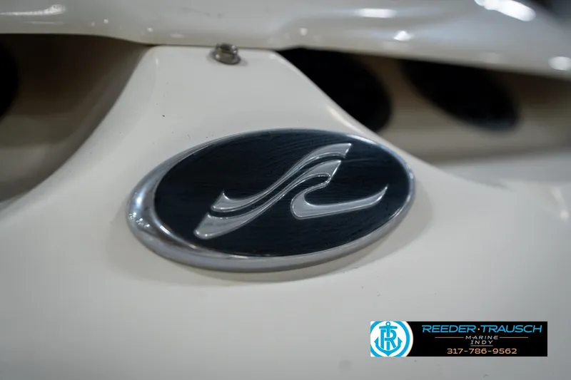 Slide: The Image of Propeller of 2005 Sea Ray 200 Sundeck boat, close-up view in a garage. - 49