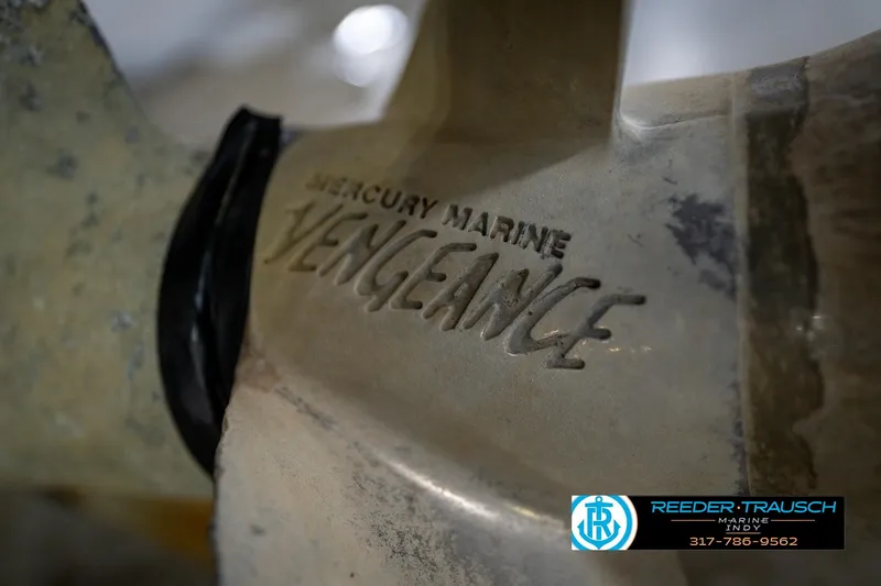 Slide: The Image of 2005 Sea Ray 200 Sundeck boat emblem with Reeder Trausch Marine logo. - 53