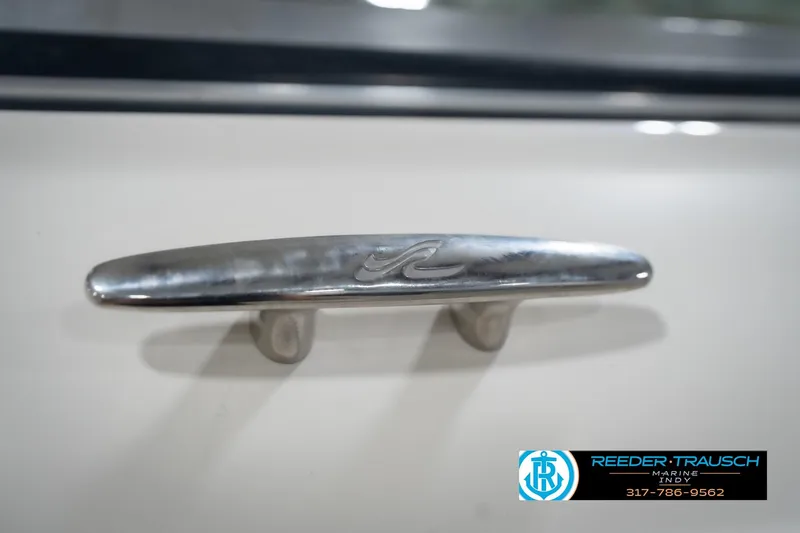 Slide: The Image of Chrome cleat on 2005 Sea Ray 200 Sundeck boat, Reeder Trausch Marine logo visible. - 57