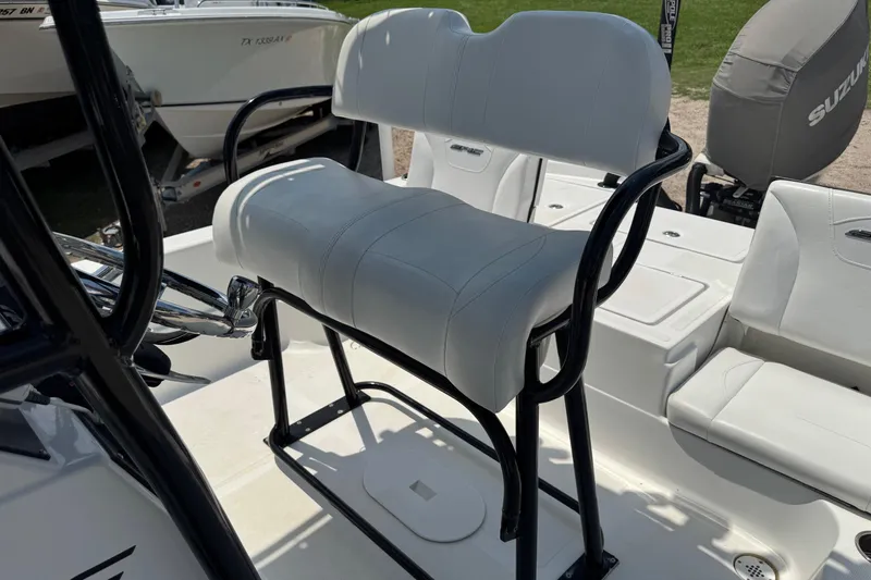 Slide: The Image of 2017 Epic 22 Sport Console boat seat with white upholstery and black frame. - 14