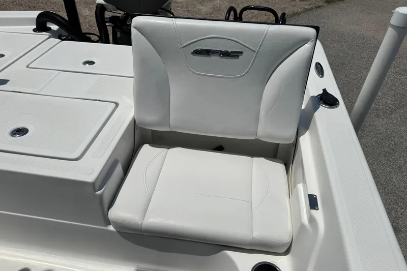 Slide: The Image of White seat on 2017 Epic 22 Sport Console boat, featuring sleek design and logo. - 16