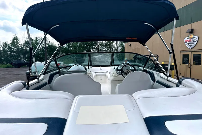Slide: The Image of 2003 Sea-Doo Utopia 185 boat interior with canopy and steering wheel. - 13