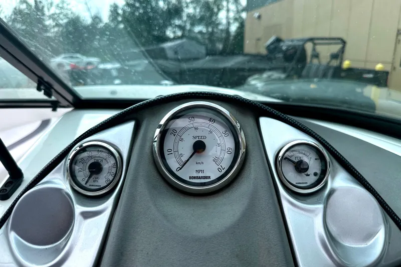 Slide: The Image of Dashboard of a 2003 Sea-Doo Utopia 185 boat with speedometer and gauges. - 18