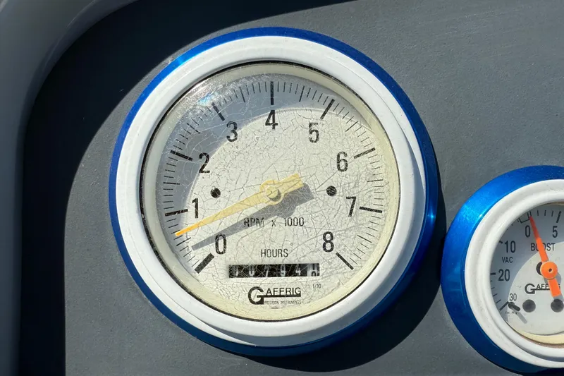 Slide: The Image of 1995 Formula 382 SR-1 tachometer and boost gauge with cracked dial face. - 21