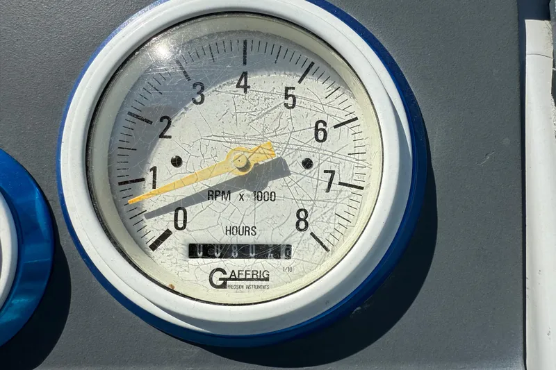Slide: The Image of Close-up of a vintage 1995 Formula 382 SR-1 tachometer gauge. - 22
