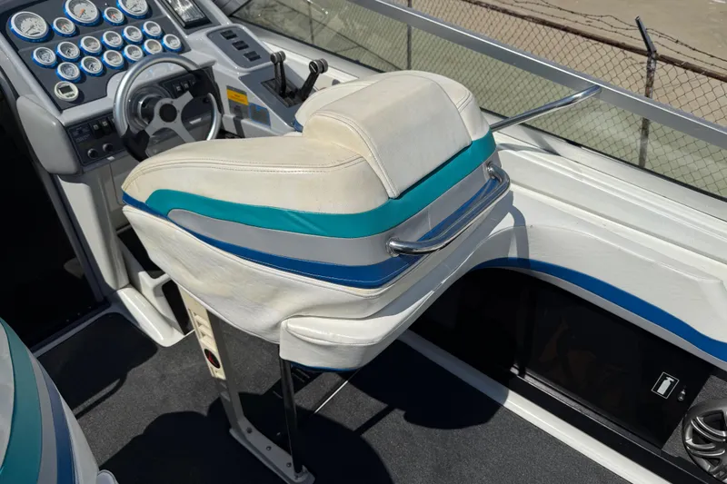 Slide: The Image of 1995 Formula 382 SR-1 boat cockpit with steering wheel and gauges. - 33