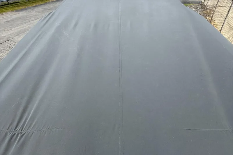 Slide: The Image of Covered 1995 Formula 382 SR-1 boat, top view, in outdoor storage area. - 36