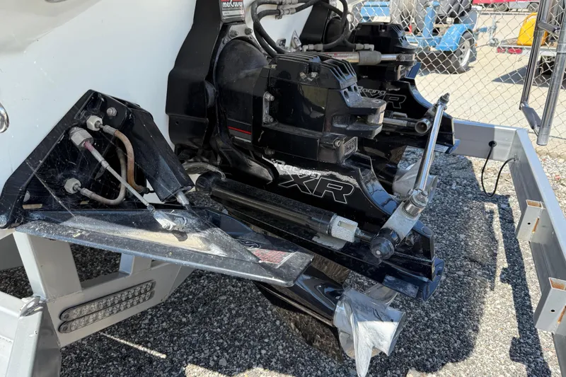 Slide: The Image of 1995 Formula 382 SR-1 boat with MerCruiser XR outdrives, parked on gravel. - 4