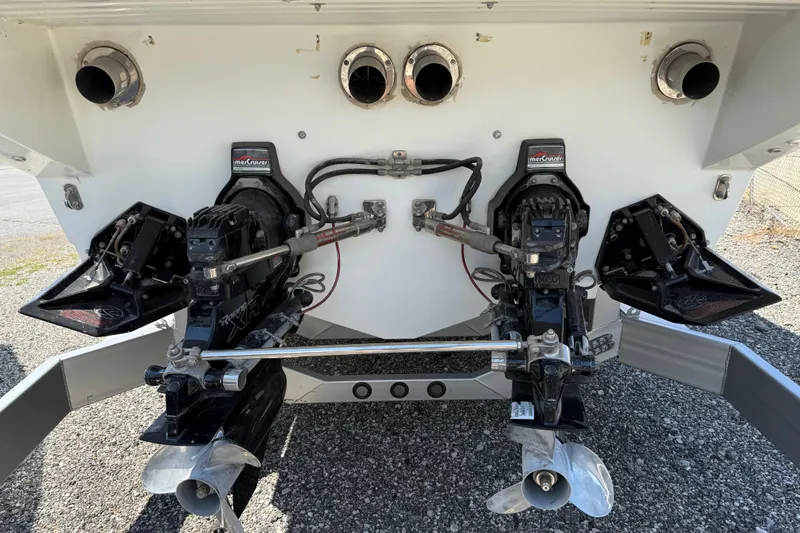 Slide: The Image of Rear view of a 1995 Formula 382 SR-1 boat with dual MerCruiser outdrives. - 6