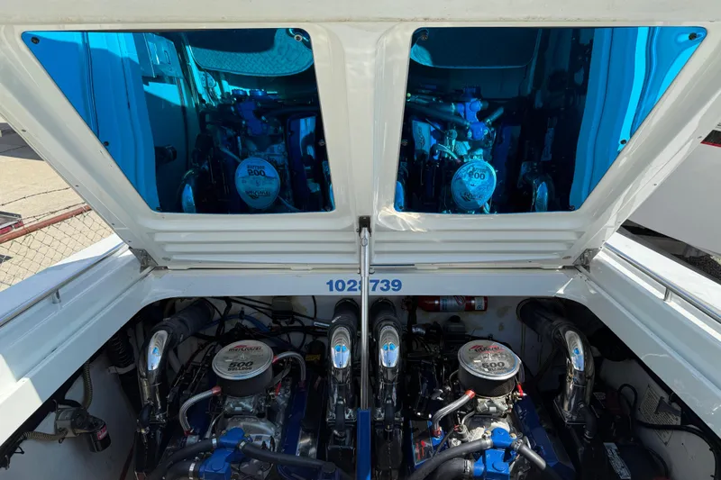 Slide: The Image of Engine compartment of a 1995 Formula 382 SR-1 boat with dual Mercury engines. - 7