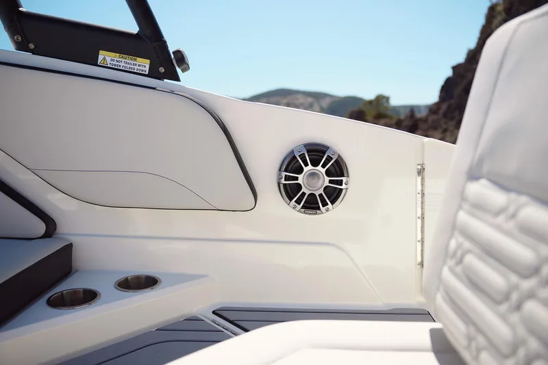 Slide: The Image of 2026 Sea Ray SPX 210 boat in showroom, rear view with swim platform. - 7