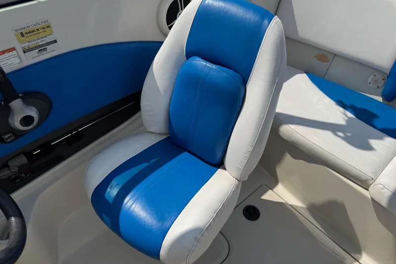 Slide: The Image of Blue and white seat in 2007 Sea Ray 195 Sport boat interior. - 12