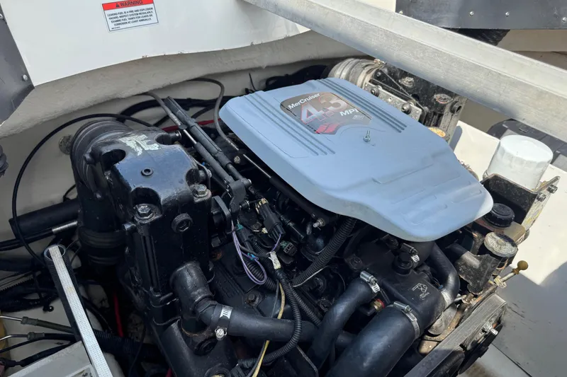 Slide: The Image of Engine of a 2007 Sea Ray 195 Sport boat, featuring a MerCruiser 4.3 MPI. - 21