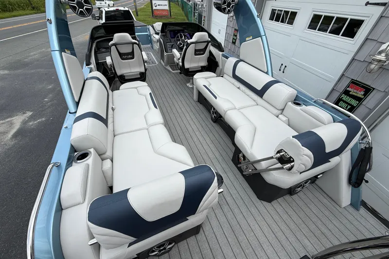 Slide: The Image of Luxurious 2026 Avalon 2585 Excalibur boat interior with plush seating and modern design. - 13