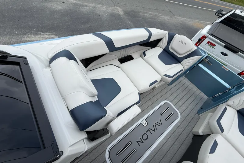 Slide: The Image of Luxurious seating on 2026 Avalon 2585 Excalibur Windshield Quad Lounger, featuring sleek design and comfort. - 16