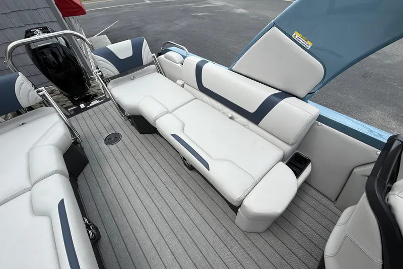 Slide: The Image of 2026 Avalon 2585 Excalibur boat interior with luxurious seating and modern design. - 22
