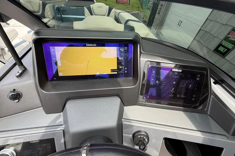 Slide: The Image of Dashboard of 2026 Avalon 2585 Excalibur with dual Simrad displays and modern controls. - 40