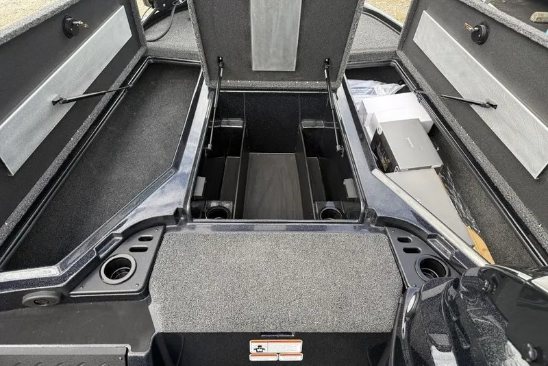 Slide: The Image of Open storage compartments of a 2026 Nitro Z18 Pro boat, showcasing interior space. - 13
