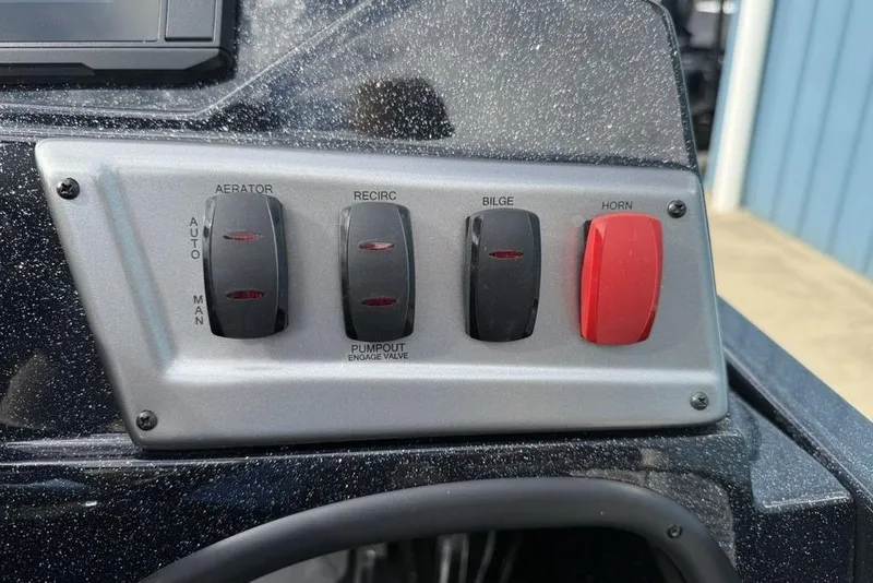 Slide: The Image of Control panel of a 2026 Nitro Z18 Pro boat with switches for aerator, recirculation, bilge, and horn. - 17