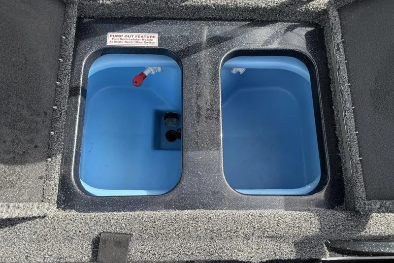 Slide: The Image of Livewell compartments in a 2026 Nitro Z18 Pro boat, featuring pump-out feature. - 22