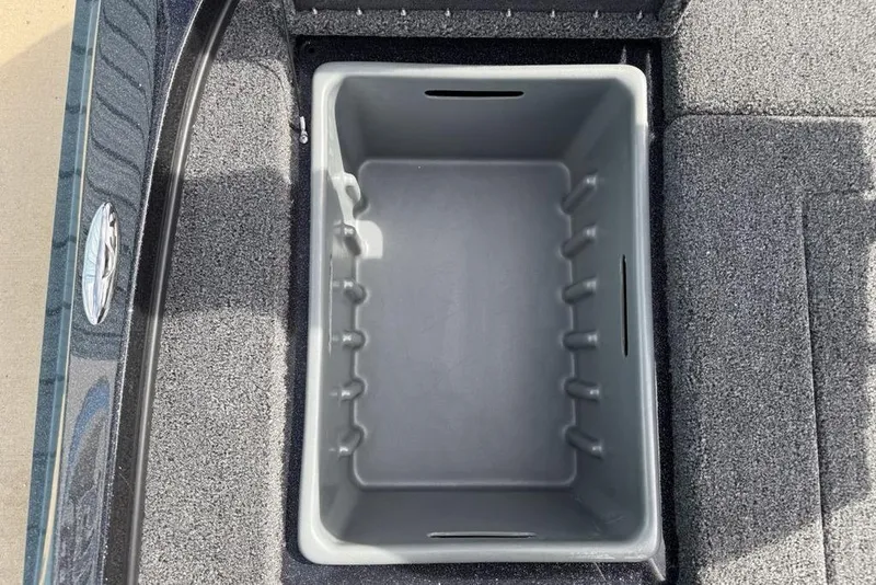 Slide: The Image of 2026 Nitro Z18 Pro storage compartment with gray interior and textured carpet lining. - 24