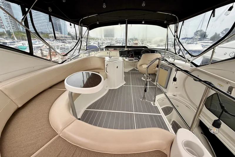 Slide: The Image of Interior view of 2014 Meridian 391 Sedan yacht with seating and helm station. - 14
