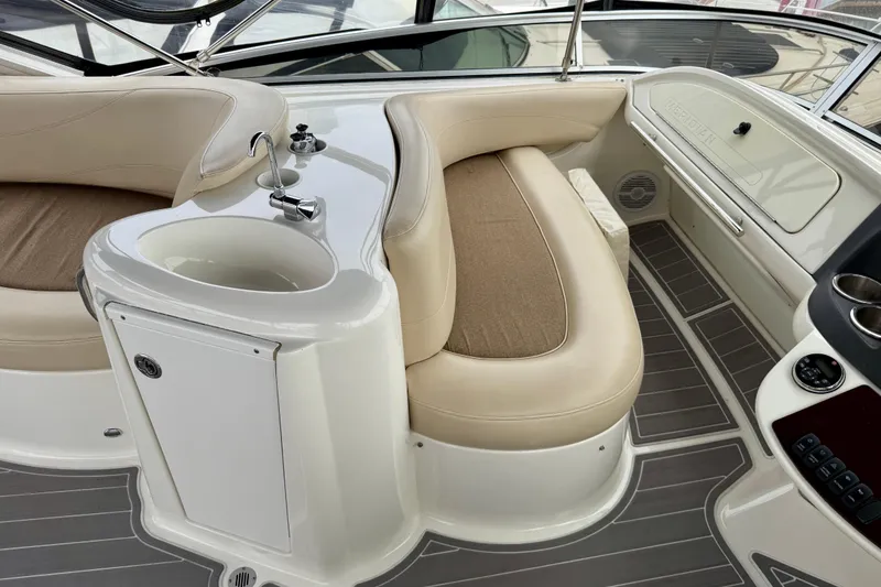 Slide: The Image of 2014 Meridian 391 Sedan interior with beige seating and compact sink area. - 15