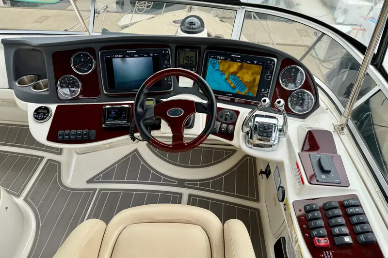 Slide: The Image of Cockpit of 2014 Meridian 391 Sedan with navigation and control systems. - 16