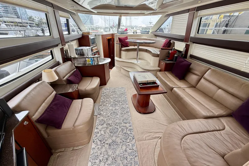 Slide: The Image of Luxurious interior of 2014 Meridian 391 Sedan yacht with plush seating and elegant decor. - 21