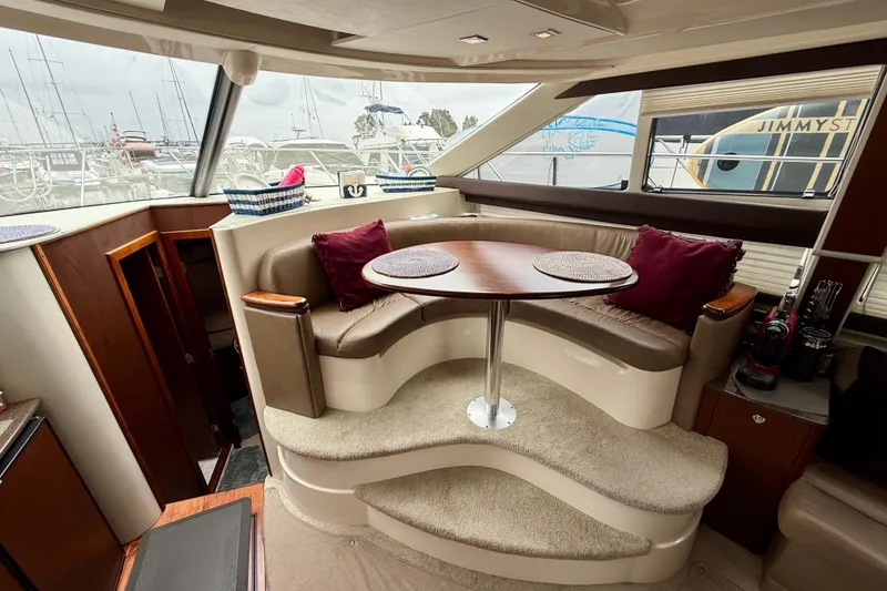 Slide: The Image of Luxurious interior of 2014 Meridian 391 Sedan yacht with elegant seating and table. - 24