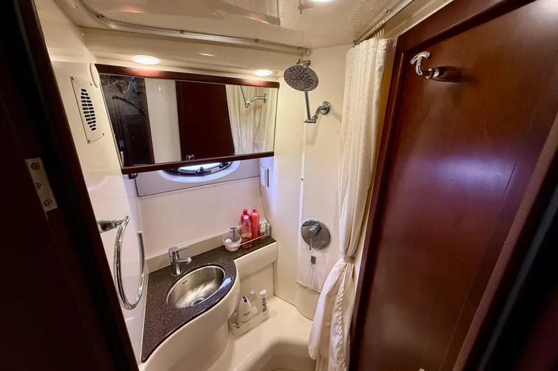 Slide: The Image of Luxurious bathroom in 2014 Meridian 391 Sedan yacht with modern fixtures and elegant design. - 36
