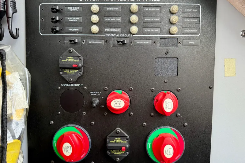 Slide: The Image of Battery management panel on a 2014 Meridian 391 Sedan boat, featuring essential circuit controls. - 45