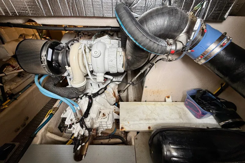 Slide: The Image of Engine room of a 2014 Meridian 391 Sedan with visible components and wiring. - 47