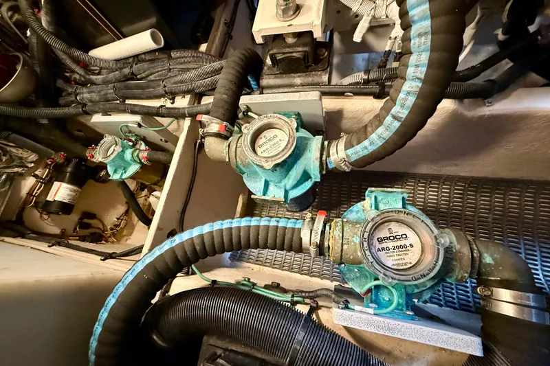 Slide: The Image of Engine room of 2014 Meridian 391 Sedan with hoses and mechanical components. - 55