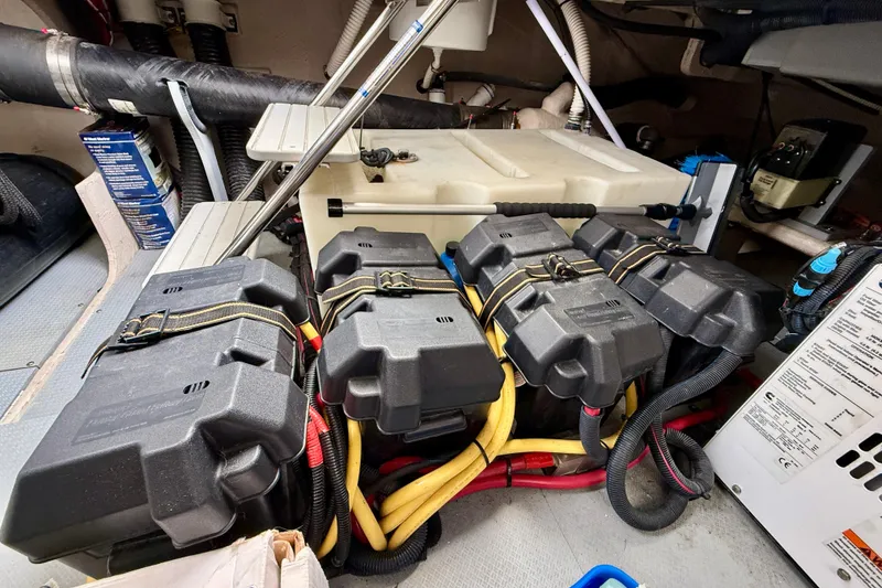 Slide: The Image of Engine room of 2014 Meridian 391 Sedan with battery setup and wiring. - 56