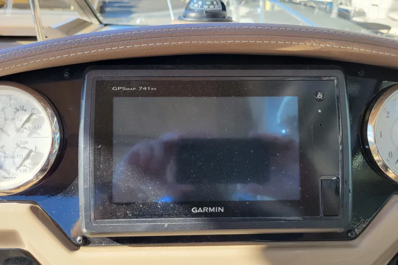 Slide: The Image of Dashboard of a 2018 Regal 26 Express with Garmin GPSMAP 741xs display. - 14