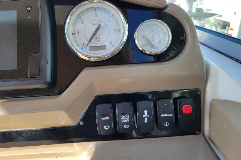 Slide: The Image of Garmin GPS display on 2018 Regal 26 Express boat dashboard, showing navigation options. - 15