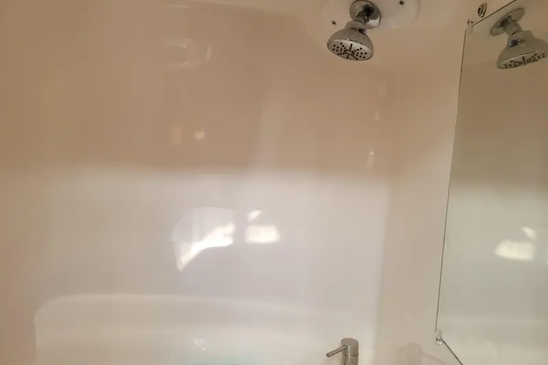 Slide: The Image of Flat screen displaying Jensen logo and slogan, "Designed to Move You," in a 2018 Regal 26 Express. - 33