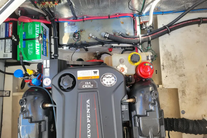Slide: The Image of Engine compartment of a 2018 Regal 26 Express boat with Volvo Penta V6 engine. - 43
