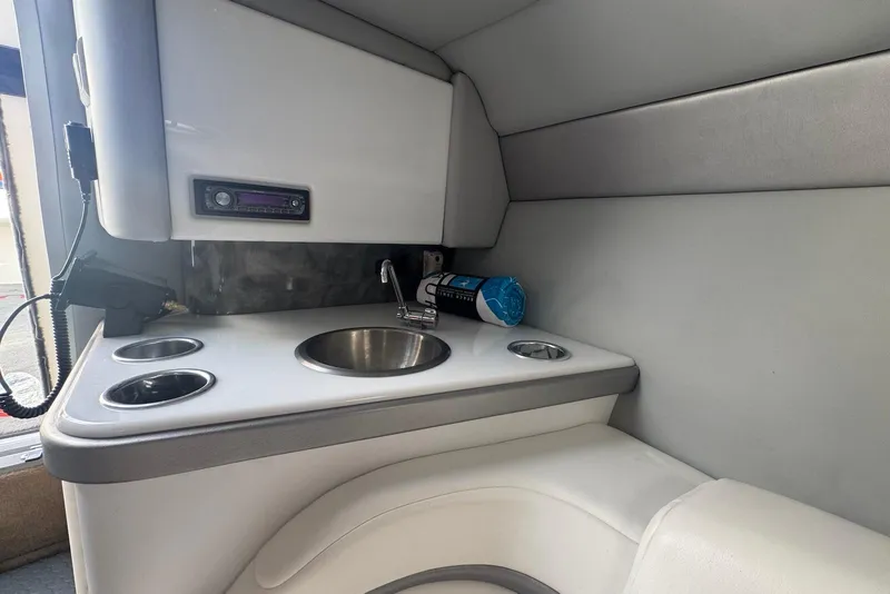 Slide: The Image of 2005 Formula 292 FASTech cabin interior with sink and storage area. - 16