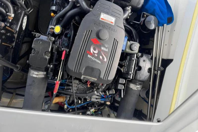 Slide: The Image of Engine compartment of a 2005 Formula 292 FASTech boat, showcasing detailed mechanical components. - 19