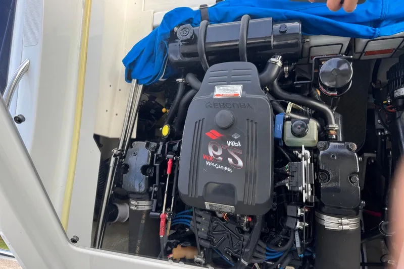 Slide: The Image of Engine compartment of a 2005 Formula 292 FASTech boat, featuring a powerful engine setup. - 20