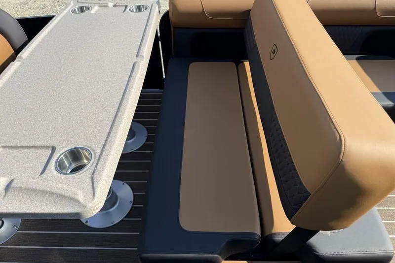Slide: The Image of Luxurious seating and table on 2026 Premier 250 Solaris RS CL boat. - 28