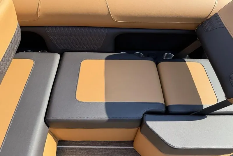 Slide: The Image of 2026 Premier 250 Solaris RS CL boat seating with tan and gray upholstery. - 30