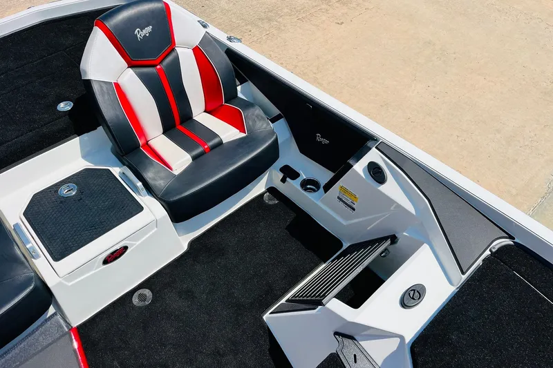 Slide: The Image of 2025 Ranger Z520 boat interior with stylish black, red, and white seating. - 28
