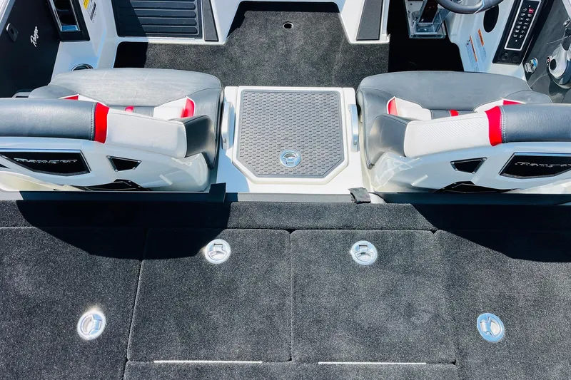 Slide: The Image of 2025 Ranger Z520 boat interior with dual seats and carpeted flooring. - 33