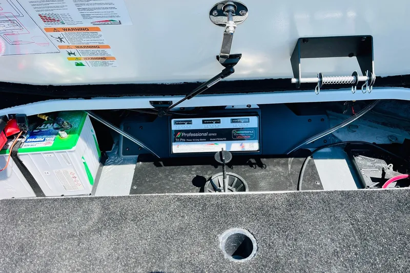 Slide: The Image of Interior view of a 2025 Ranger Z520 boat showing battery and wiring setup. - 36