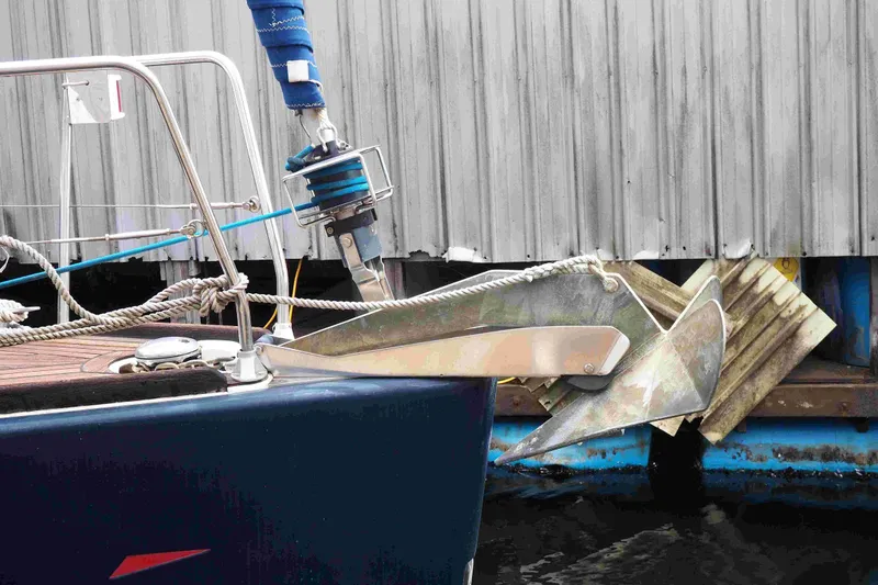 Slide: The Image of Dufour 40 Performance 2004 yacht anchor and bow detail at dock. - 13